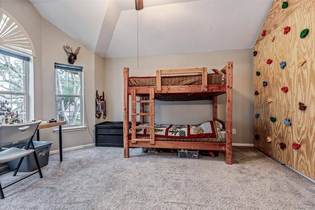 Rooms so large you can fit a rock climbing wall in them! Available to easily remove if new owners wish. How cool is that?!