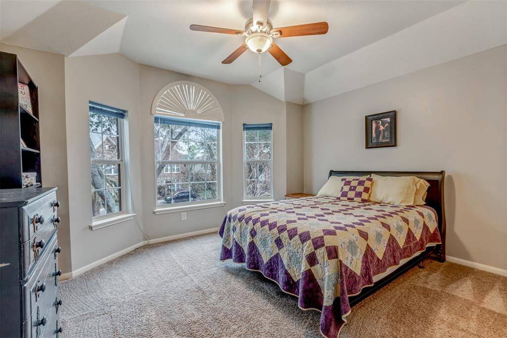 Absolutely fantastic windows with lots of natural light found throughout the home such as these in this secondary bedroom.