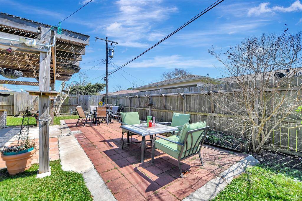 Large stoned area for tables and backyard barbeques