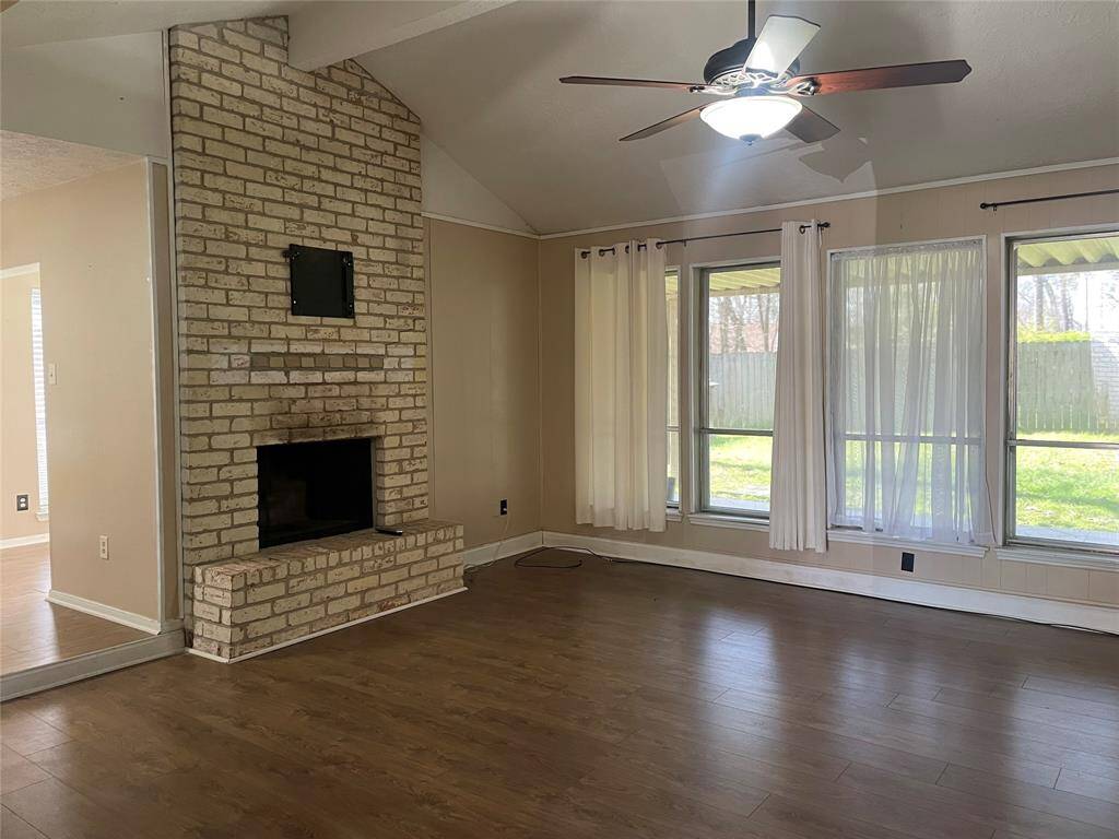 High ceilings & wall of windows