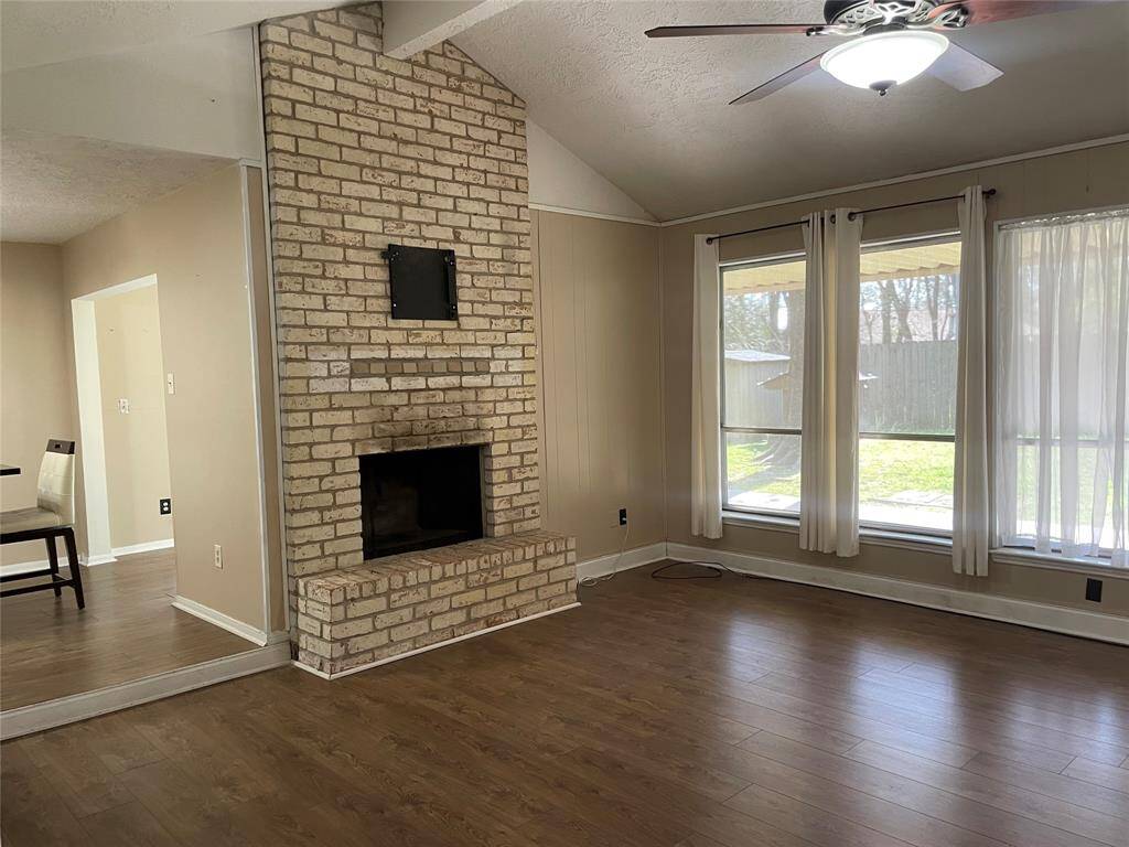Brick fire place is the focal point
