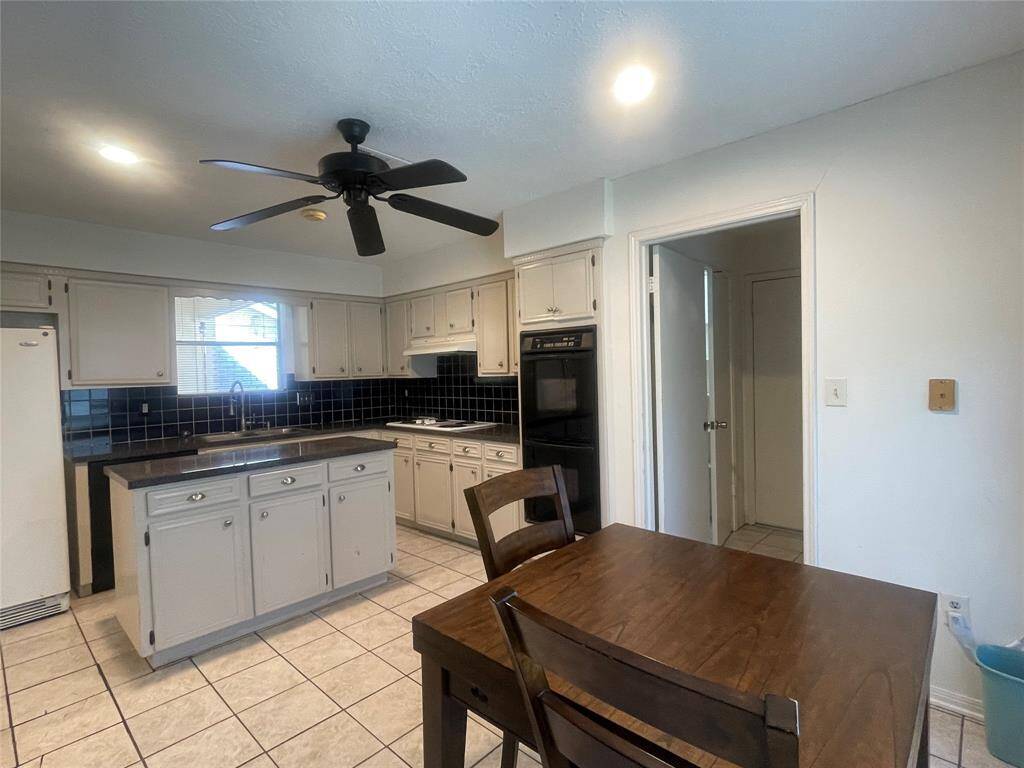 Kitchen has a separate breakfast area