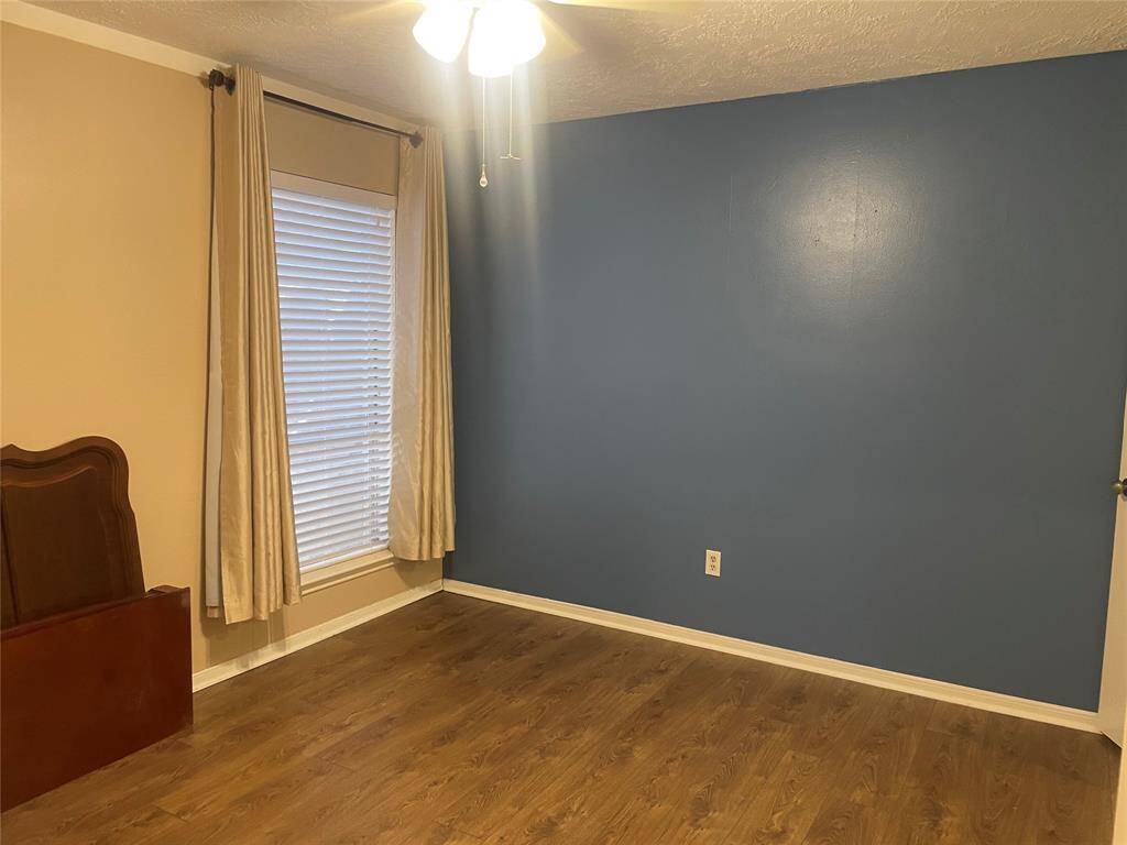 Secondary bed room at the front of the home (perfect for an office)