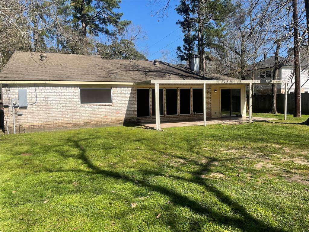 Huge backyard W/ green space in the back
