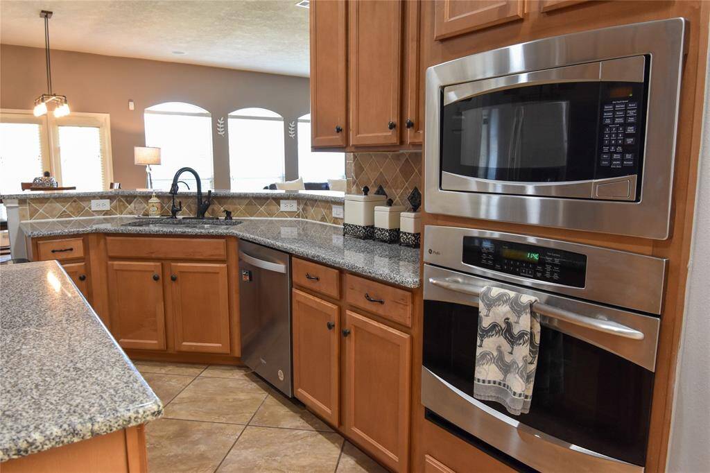 Featuring stunning inset stainless steel appliances.