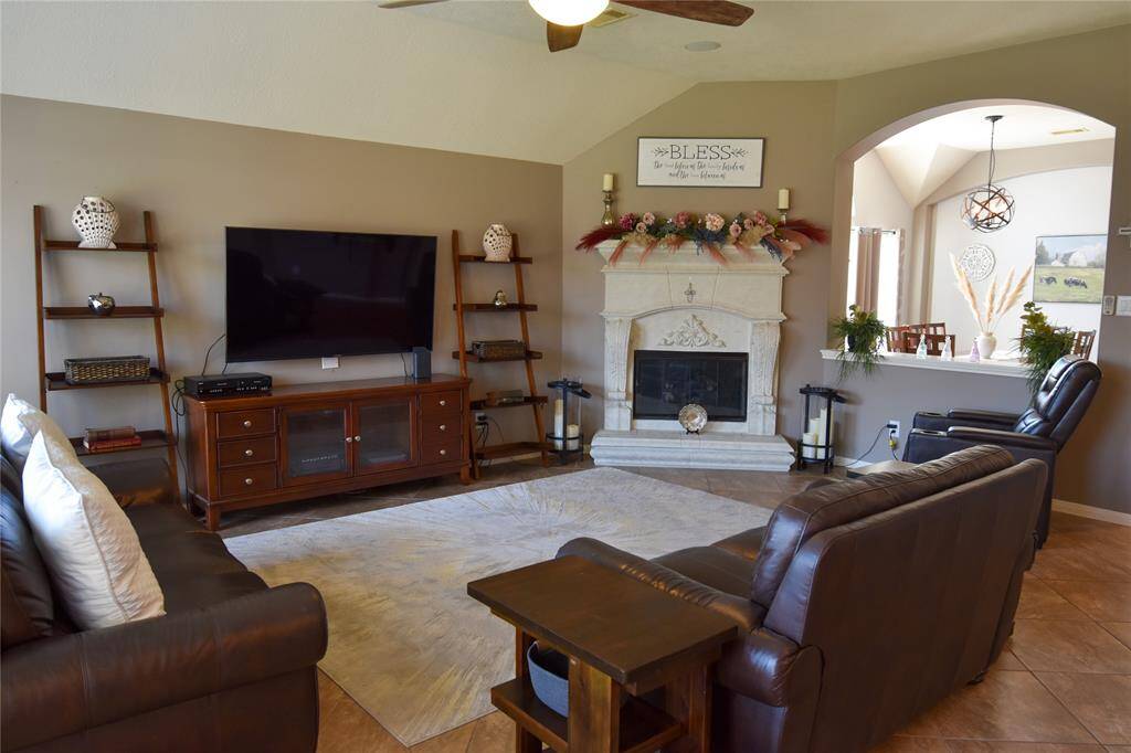 Step into an inviting open-concept living space with soaring ceilings, abundant natural light, and stylish finishes.
