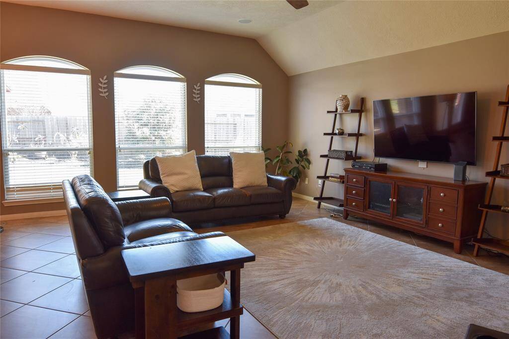 The neutral color palette and modern design create a warm and welcoming atmosphere, perfect for relaxing or entertaining guests.