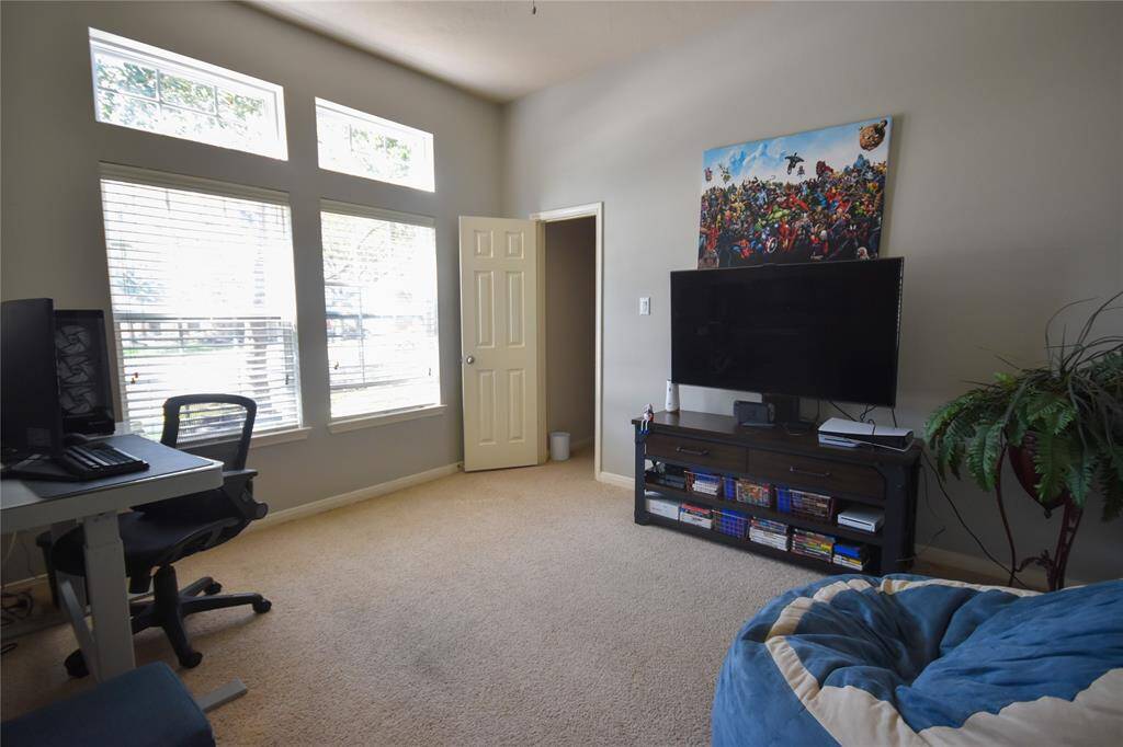 This versatile bedroom has been beautifully transformed into a home office, offering a quiet and productive space for remote work or creative projects.