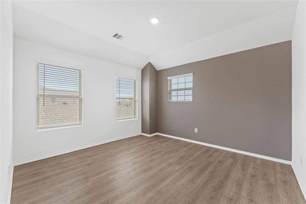 Game room comes with an accent wall