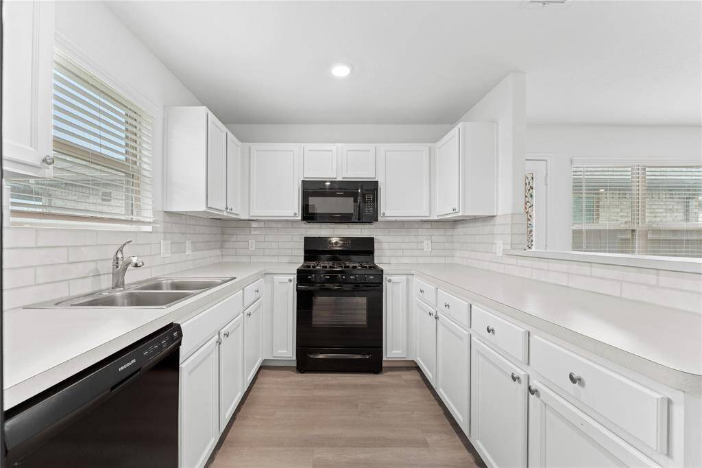 This Kitchen makes every square inch count. Clean and uncluttered) Cosy and efficient