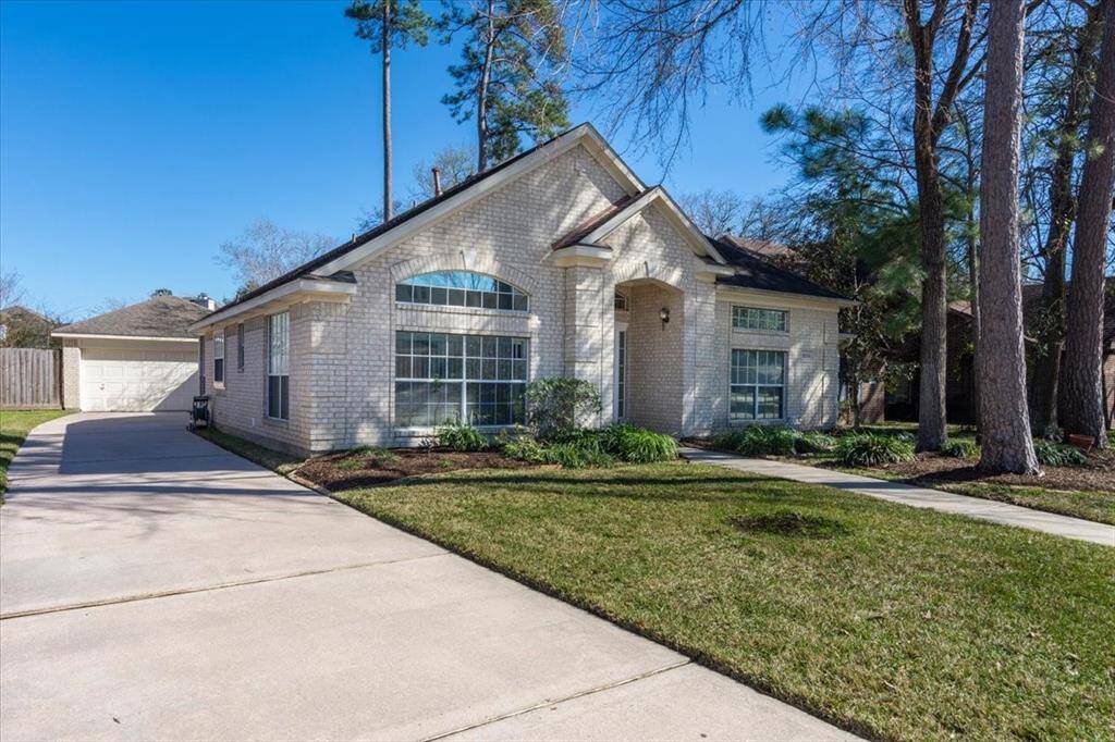 This charming one-story home features a detached 2-car garage with ample storage space, offering both convenience and functionality.