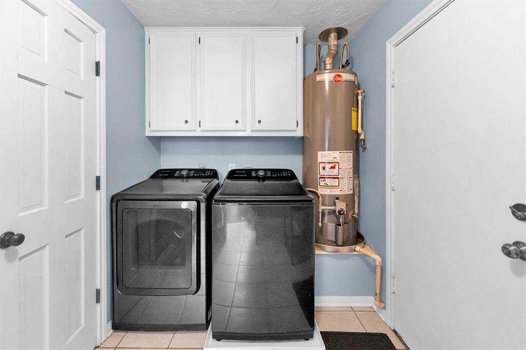 Laundry room with half bath