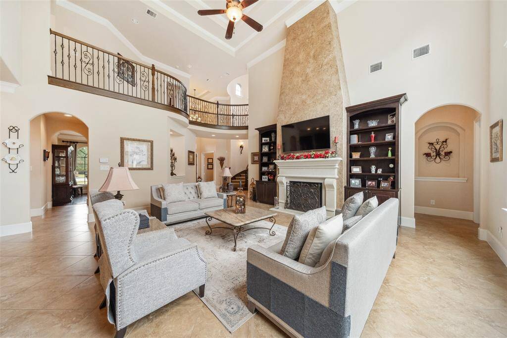 Enjoy the view of this fabulous family room and grand fireplace.