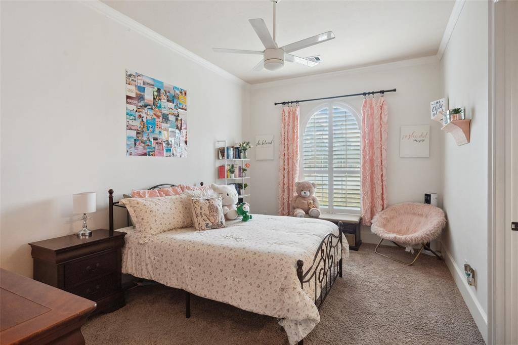 This is the secondary bedroom downstairs with full bath.