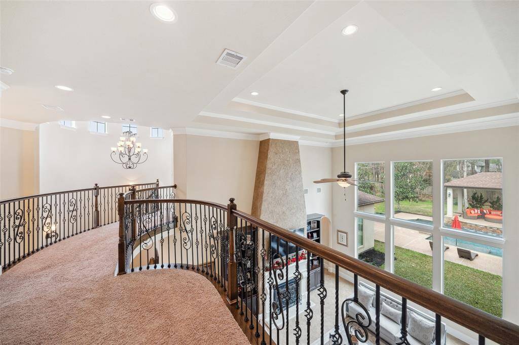 Beautiful wrought iron balusters with an outstanding view of the home.