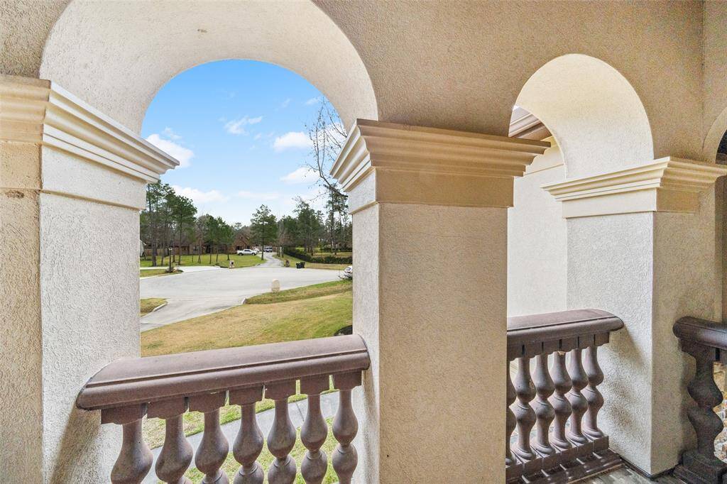Open the doors to the balancy and enjoy the view from the front of the home.