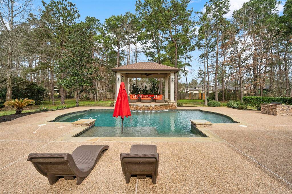 A quiet place to unwind, entertain or throw a party! This pool is elegantly designed.