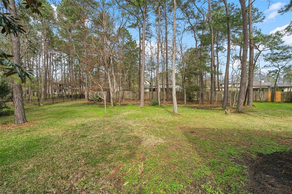 This acre lot shows itself off with all of the amenities it beholds.