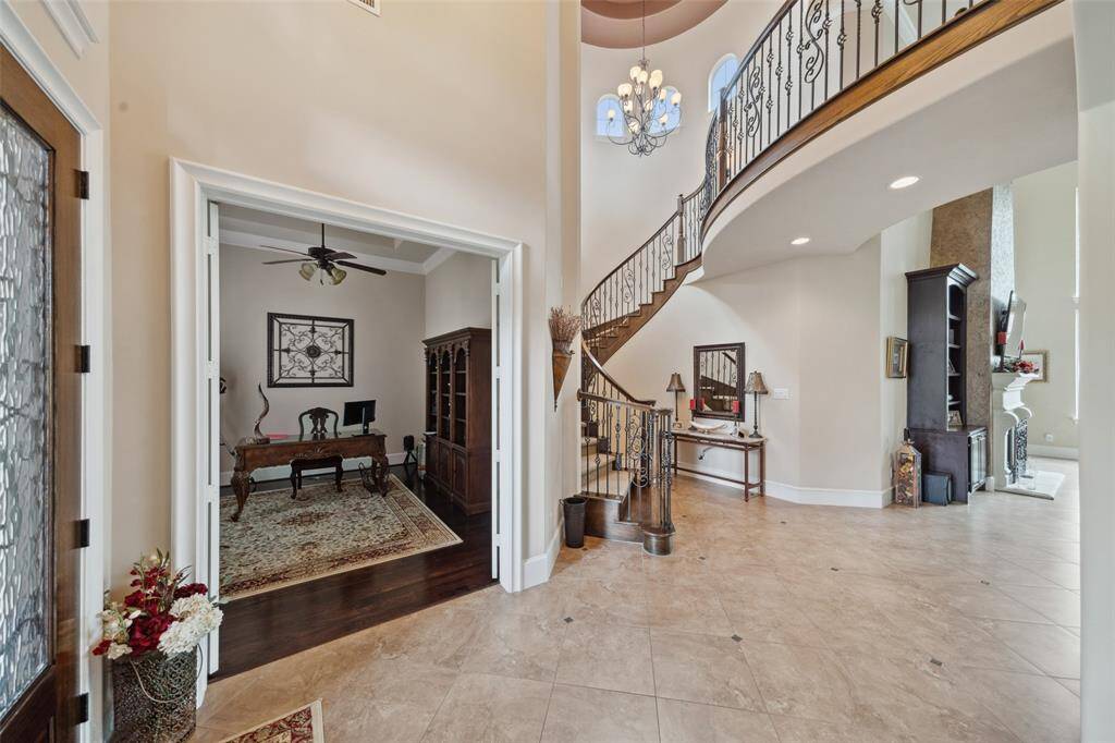 Enter this home with graceful staircase and study to the left.