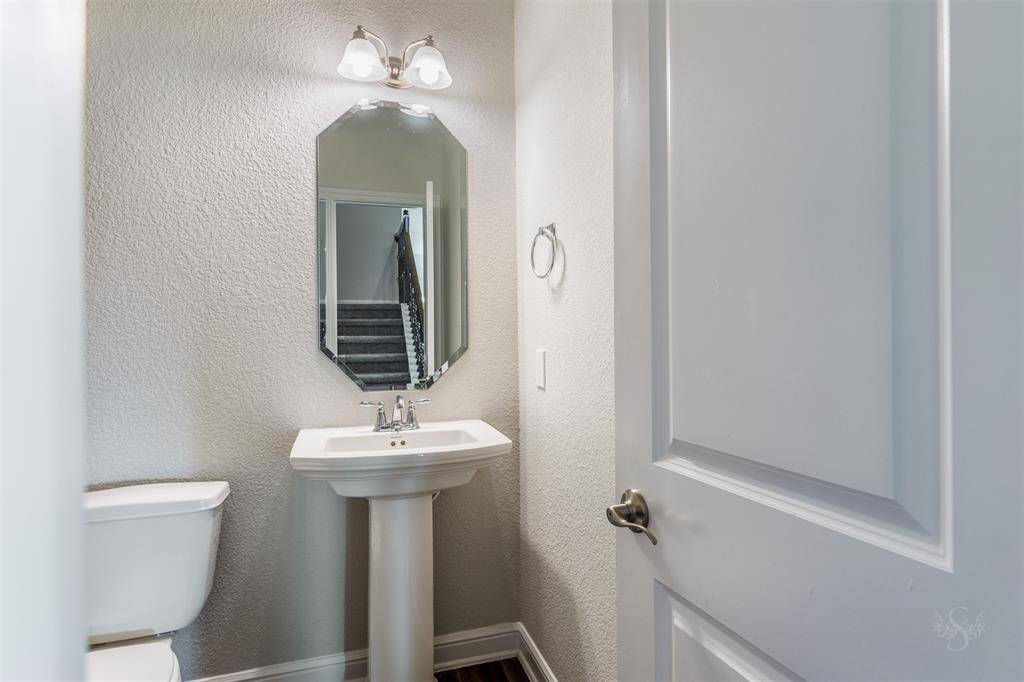 A convenient half bath for your guests.