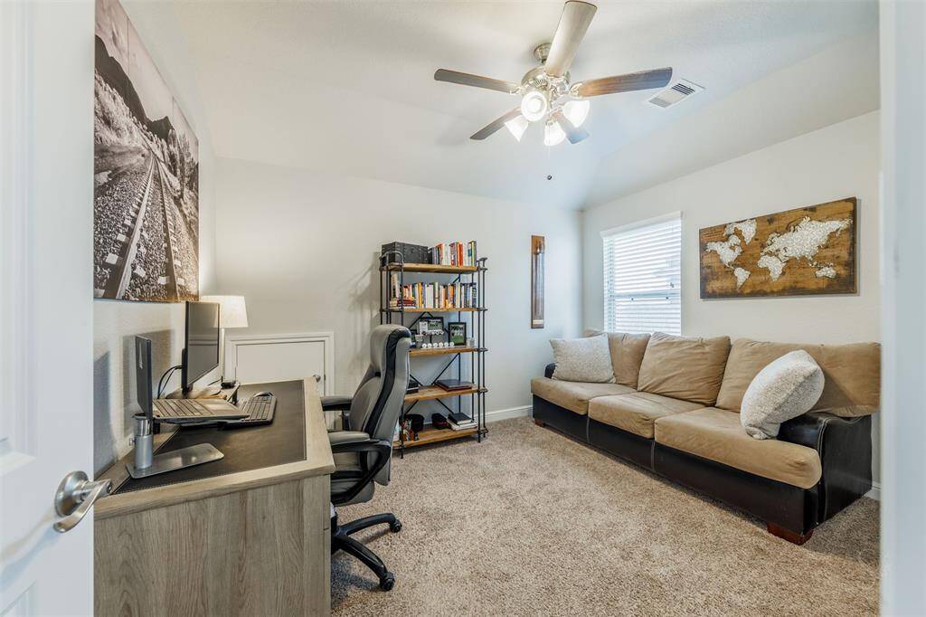 This spacious game room is the perfect place for a pool table and fun family activities! Plenty of room for friends and family to gather for a movie or a night of games!