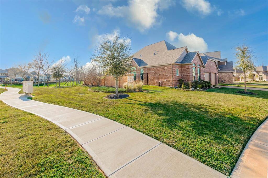 Situated on a desirable corner, greenbelt lot, this home offers extra yard space, enhanced privacy, and fantastic curb appeal.