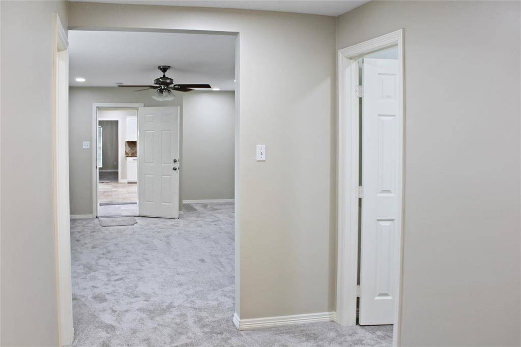 Primary suite on the first floor with dual walk-in closets.