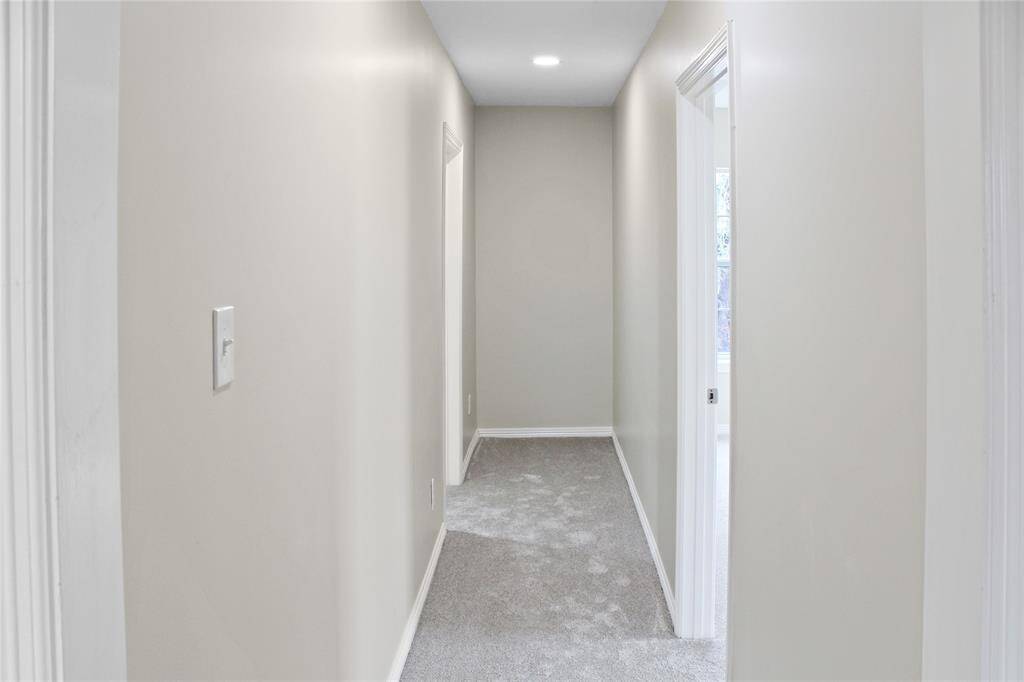 Upstairs hallway leading to bedrooms 4 and 5.