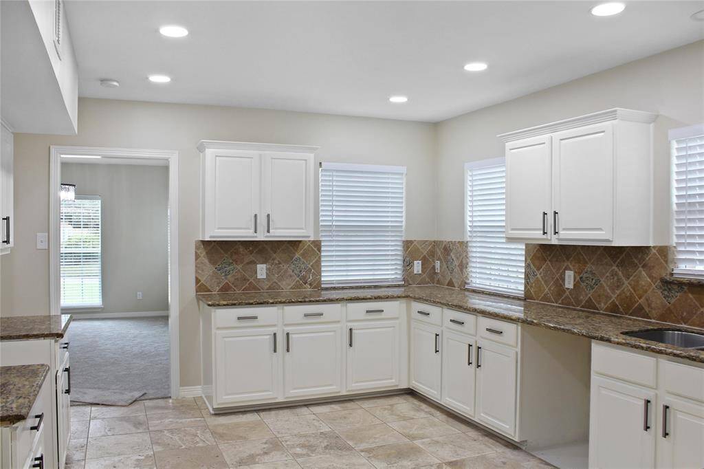 Another angle of kitchen from in front of the kitchen pantry
