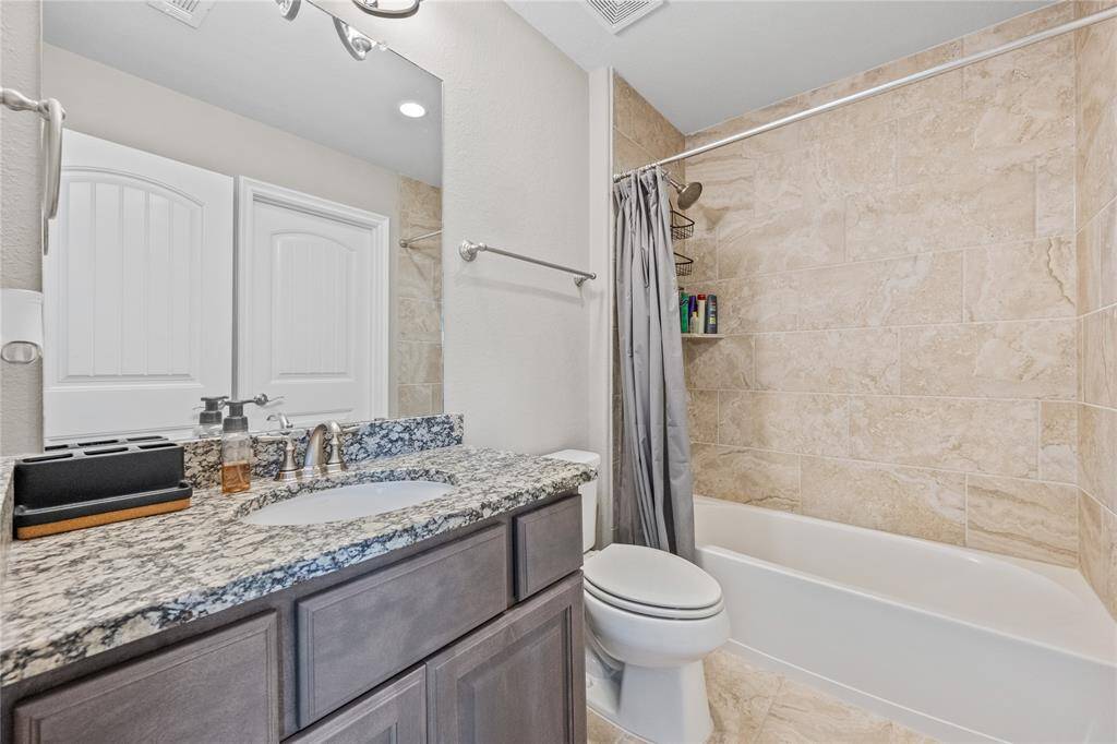 Upgraded honed granite in Upstairs Baths!