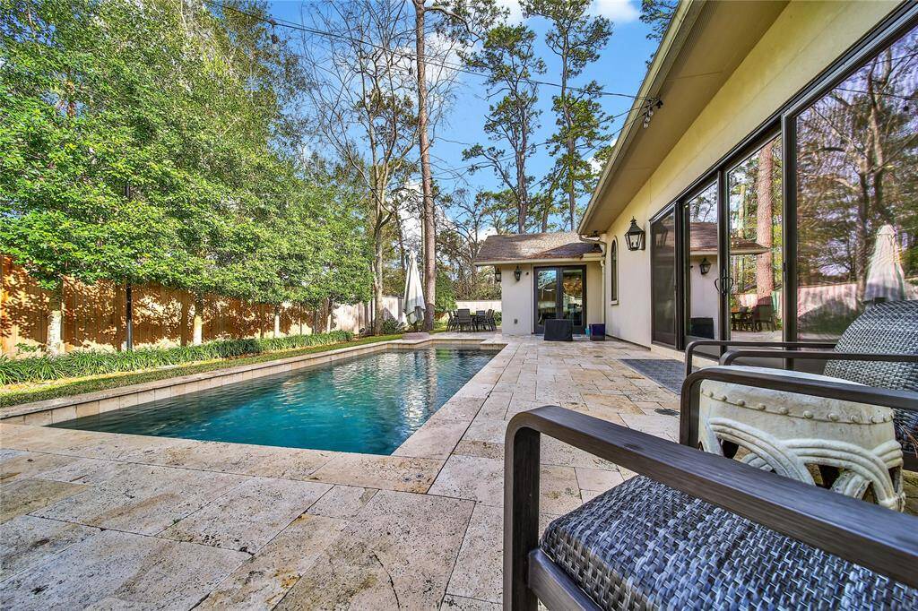 Beautiful backyard with pool and plenty of yard space.