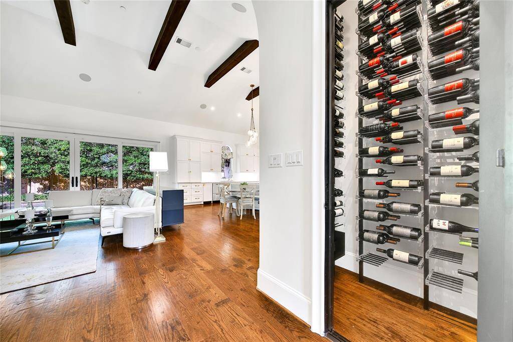 Temperature controlled wine room that can hold up to 400 bottles.