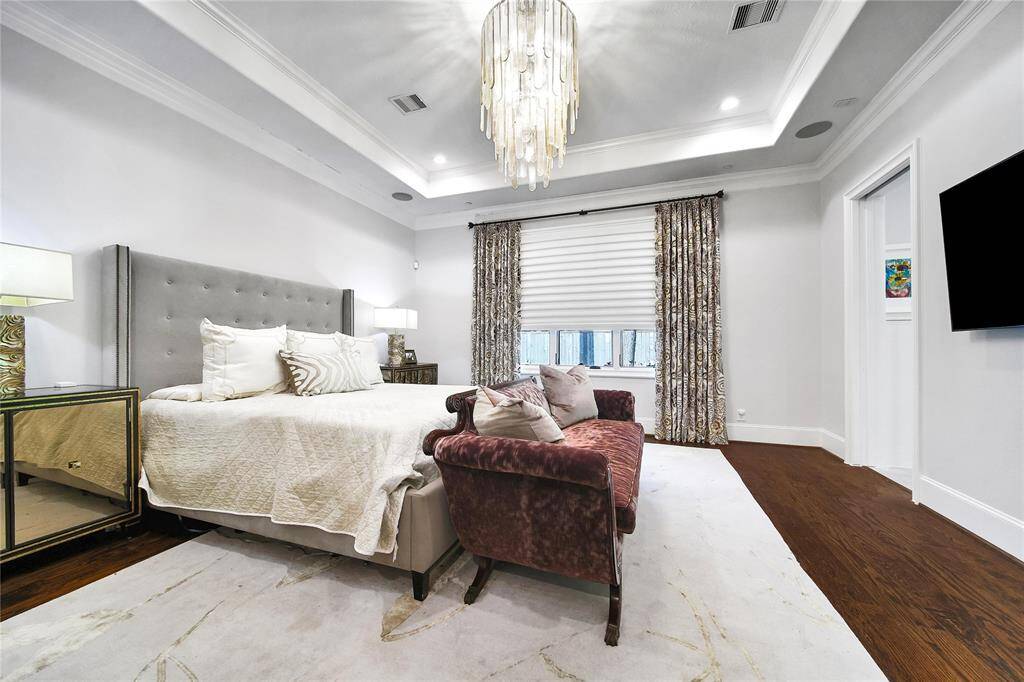 Spacious primary bedroom with ensuite bathroom.