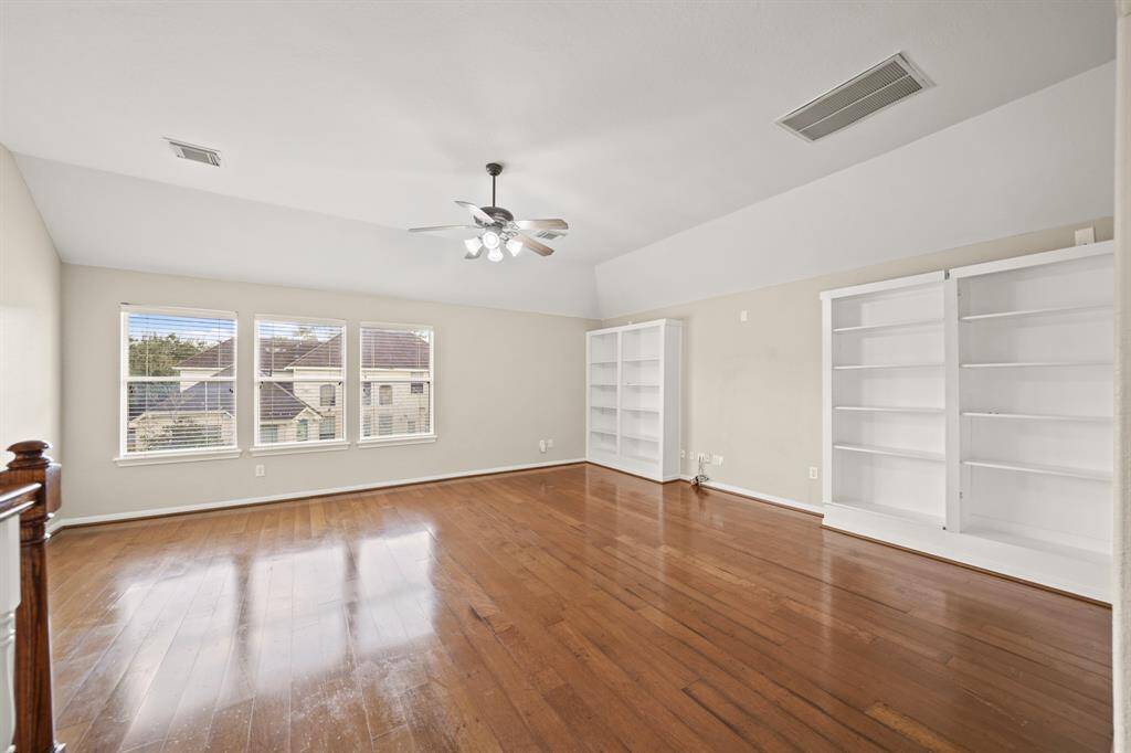 The large game room has custom built-ins.
