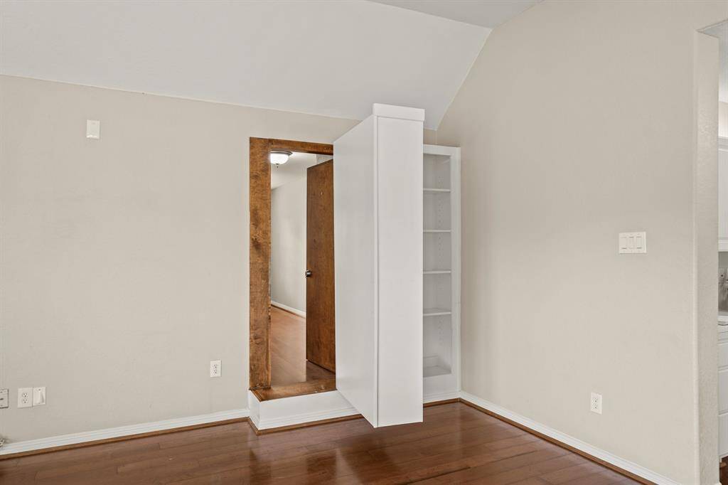 Want to know a secret? There is a hidden room behind the bookcase! There is a biometric (fingerparint) lock and hardwood flooring. This room has been used as a home office. Could also be used as a play room or a huge climate controlled storage room.