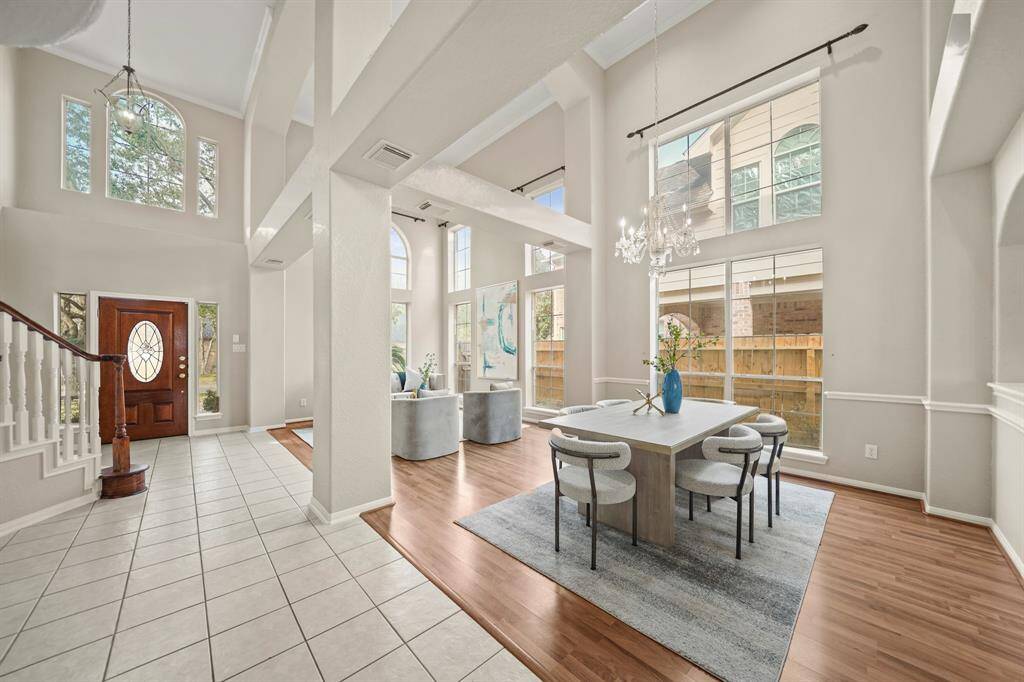 This open floor plan is FABULOUS! The home has a neutral palette, which will work with any style of decor.