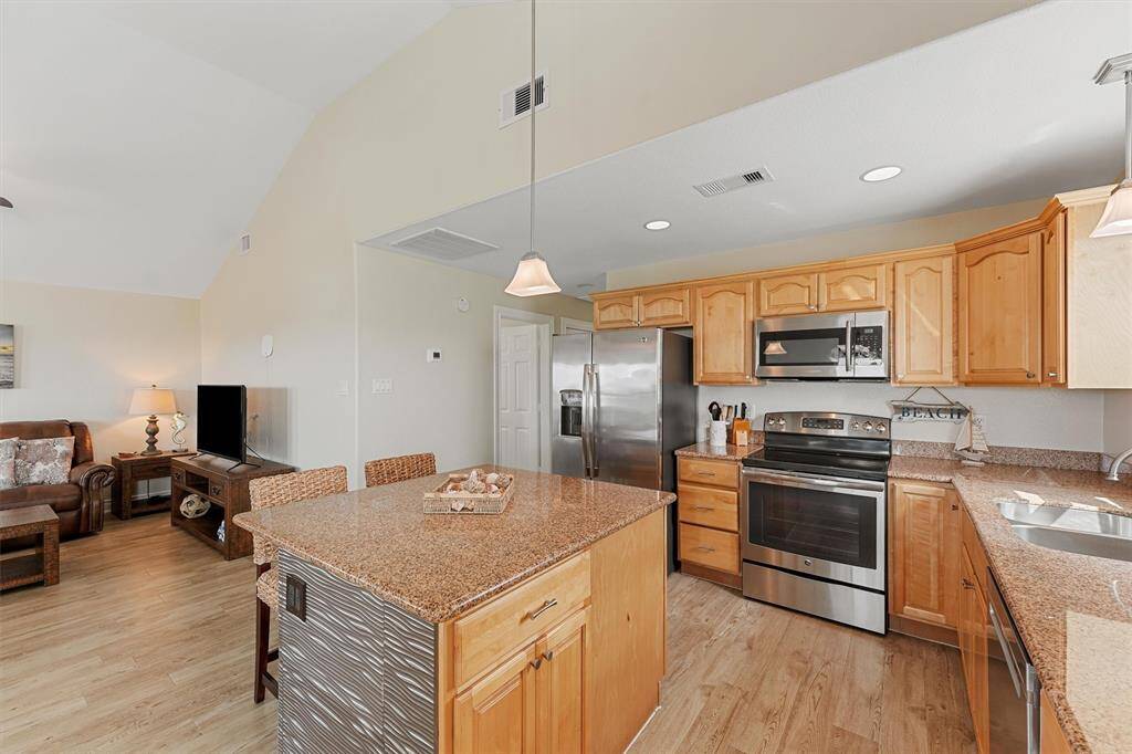 Imagine cooking in this spacious kitchen with granite stone counters.