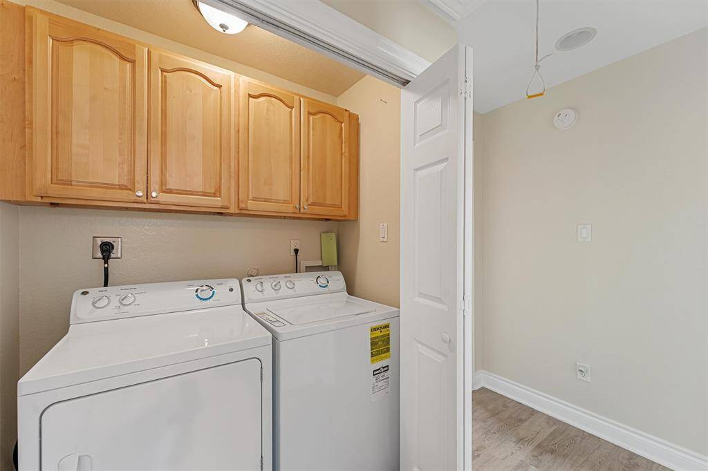 Laundry off corridor separates the second and third bedrooms