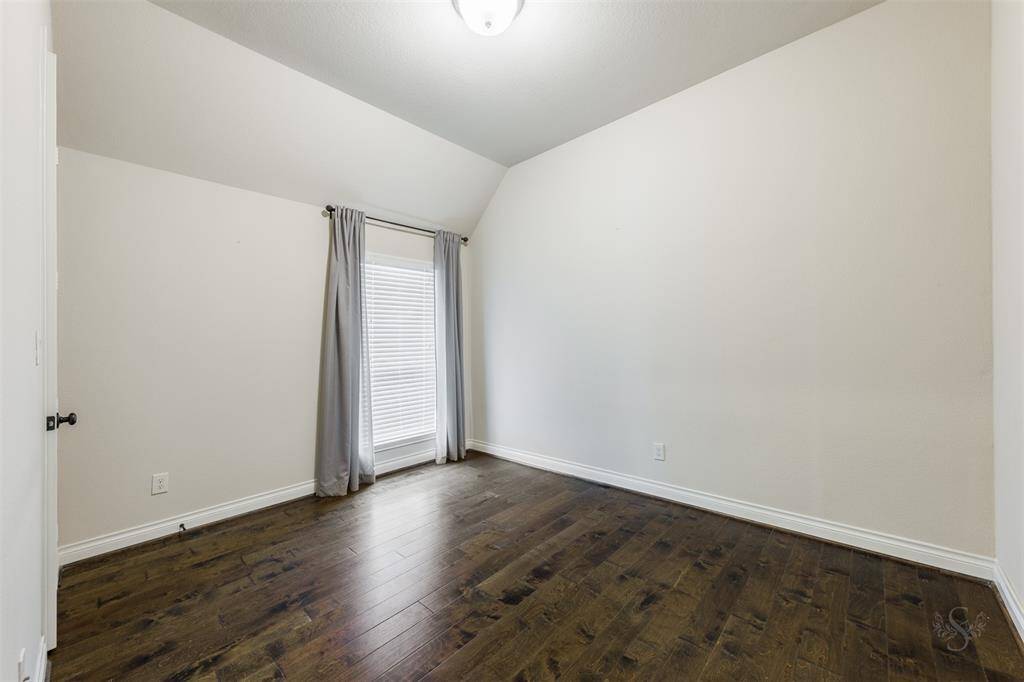 The 3 secondary bedrooms provide the space you'll want for a large bed and any additional furnishings needed including student desks and bookcases. Featuring gorgeous wood flooring, high angled ceiling and window with custom blinds.