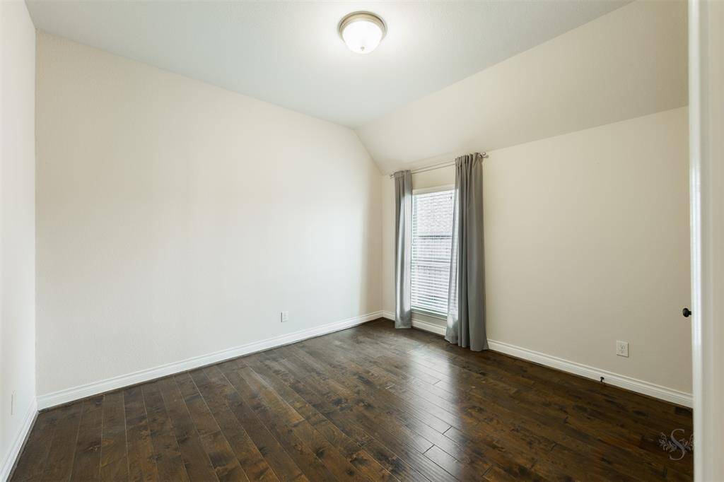The 3 secondary bedrooms provide the space you'll want for a large bed and any additional furnishings needed including student desks and bookcases. Featuring gorgeous wood flooring, high angled ceiling and window with custom blinds.