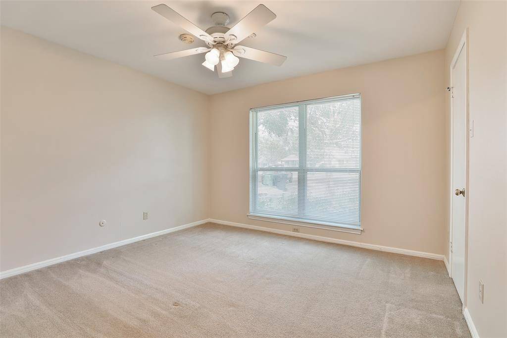 This is your front bedroom featuring 2 walk in closets and double paned windows!