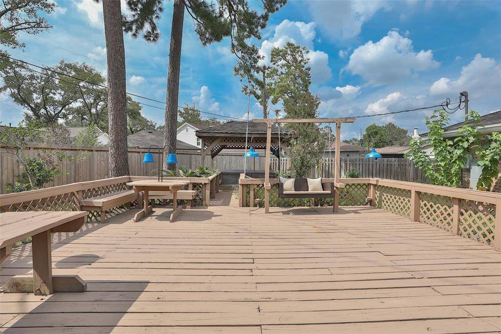 Brand new swing and built in seating.  Lots of tables/seating and space for you to enjoy this deck!