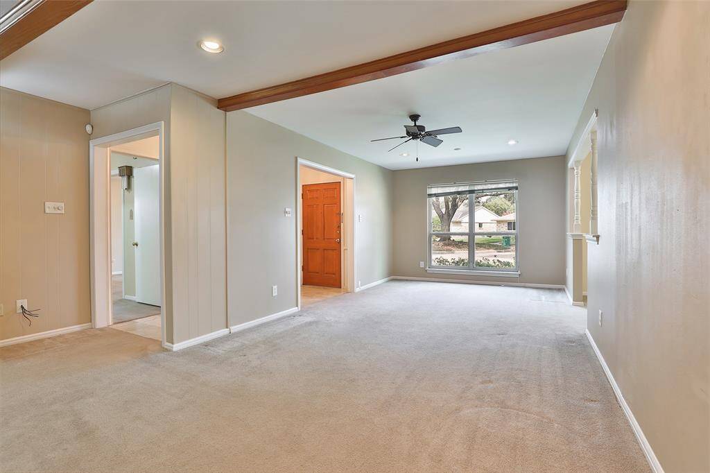 Your living room/den areas were walls were removed to create one expansive area!
