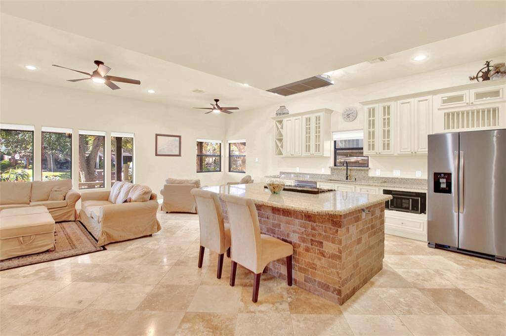 Oversized Kitchen Granite Breakfast Bar With Upgraded 5 Burner Stainless Steel Oven/Range