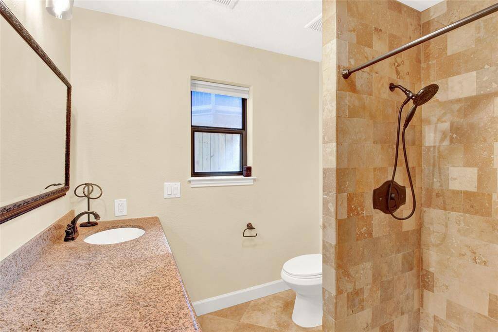 Secondary Bathroom With Upgraded Shower-Shower Fixtures And Sizable Vanity