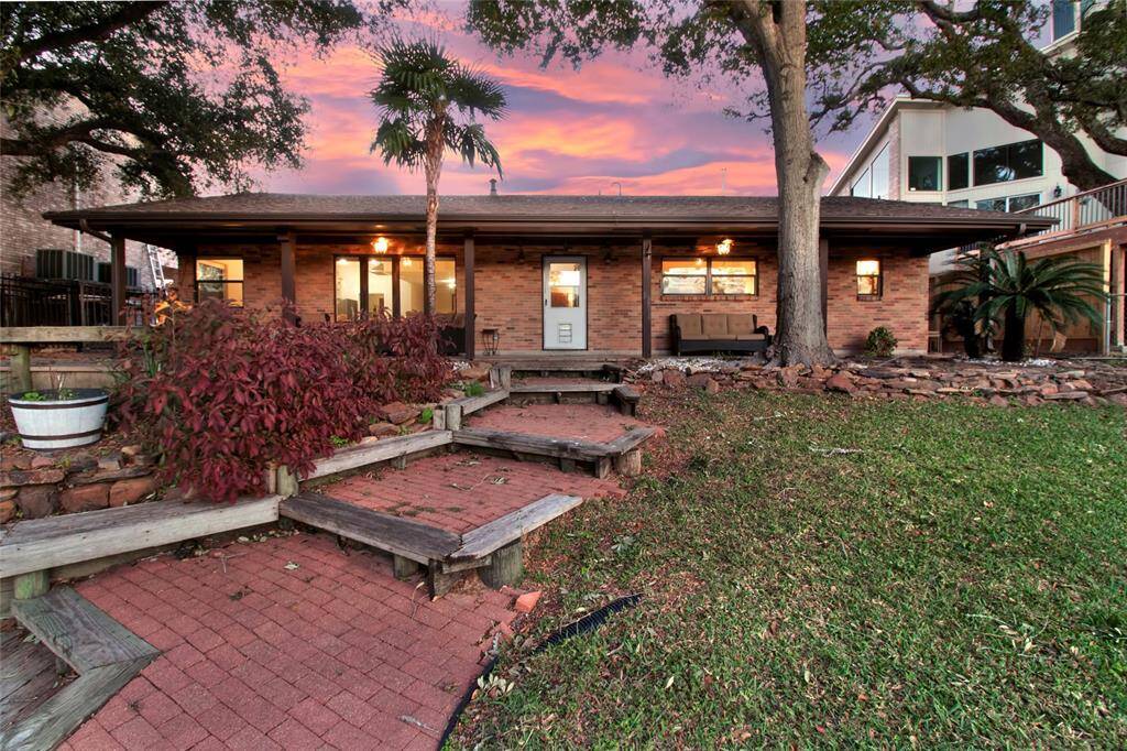 Beautifully Landscaped Backyard and Pavers, Stairs, And Deck!