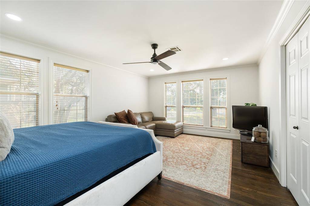 Huge Front bedroom downstairs has space for a sitting area and views the front yard