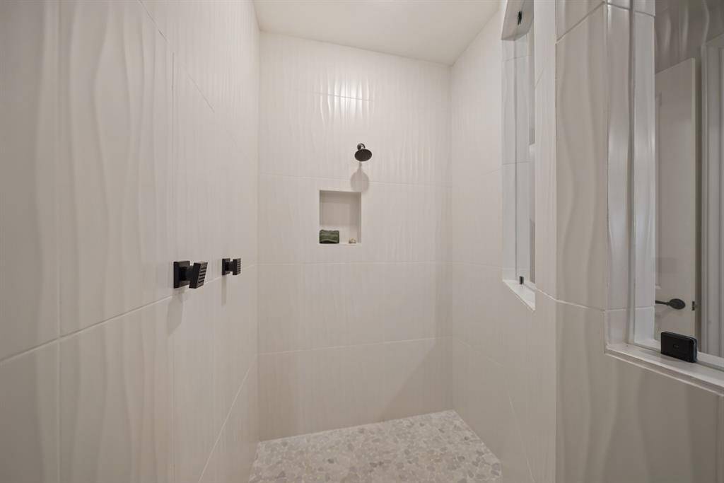 Oversized custom spa-like shower.