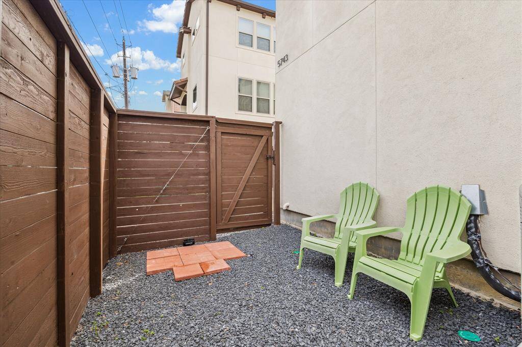 Securely fenced front yard for added privacy.