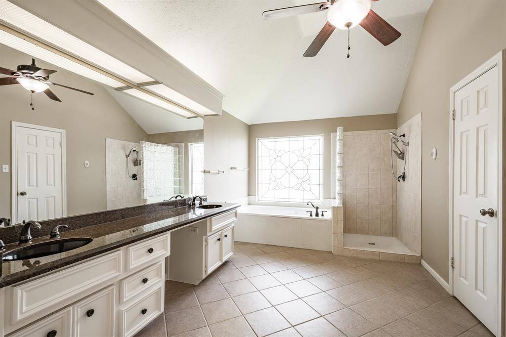 En suite primary bathroom. Recently painted.